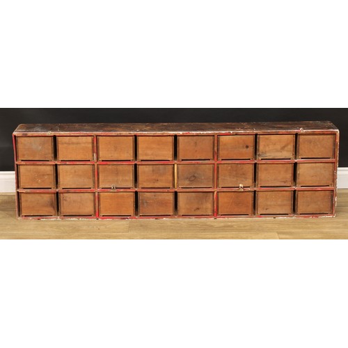 1324 - A late 19th century medicine or apothecary chest, of twenty-four drawers, each labelled, faceted gla... 