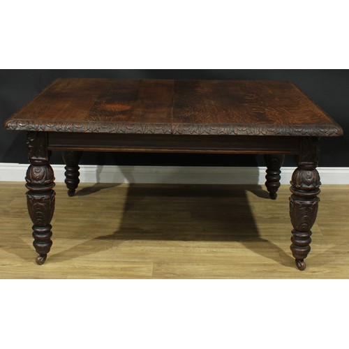 1337 - A late Victorian oak dining table, rectangular top with foliate carved edge, turned legs carved with... 