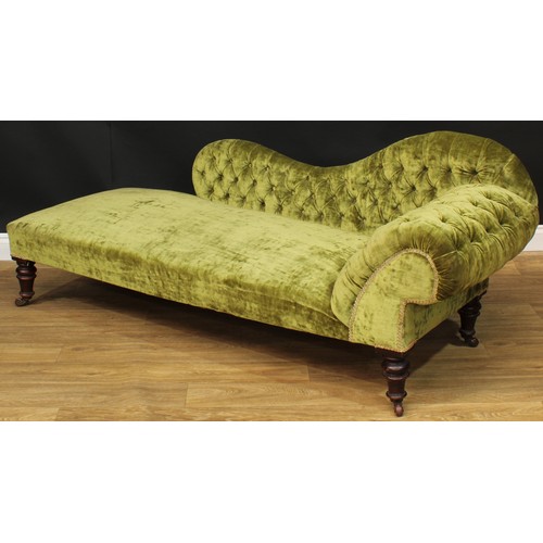 1457 - A Victorian chaise longue, stuffed-over upholstery, deep-button back and side, turned legs, ceramic ... 