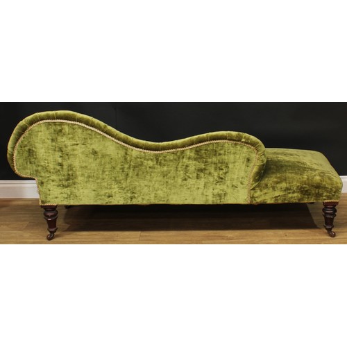 1457 - A Victorian chaise longue, stuffed-over upholstery, deep-button back and side, turned legs, ceramic ... 