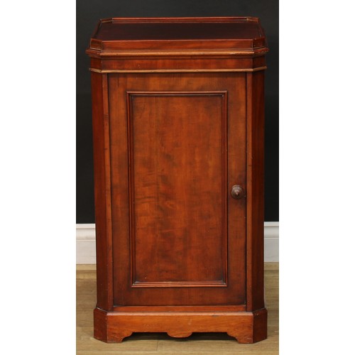 912 - A 19th century mahogany bedroom pedestal, canted rectangular top with moulded edge above a panel doo... 