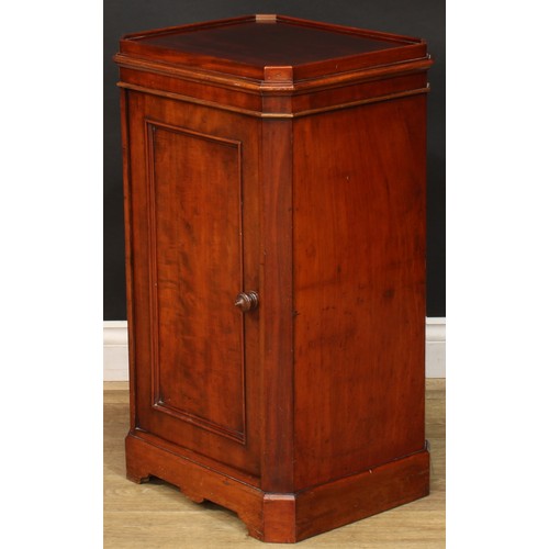 912 - A 19th century mahogany bedroom pedestal, canted rectangular top with moulded edge above a panel doo... 