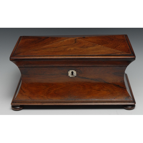 1201 - A post-Regency rosewood concave sarcophagus tea caddy, hinged cover enclosing a bowl aperture and a ... 