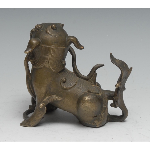 808 - Chinese School (19th century), a bronze, of a temple dog or kylin, 10.5cm high