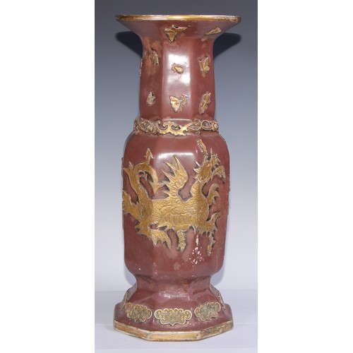 447 - A pair of large Ironstone vases, each moulded and picked out in gilt in the Chinese taste with drago... 