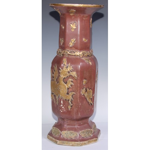 447 - A pair of large Ironstone vases, each moulded and picked out in gilt in the Chinese taste with drago... 