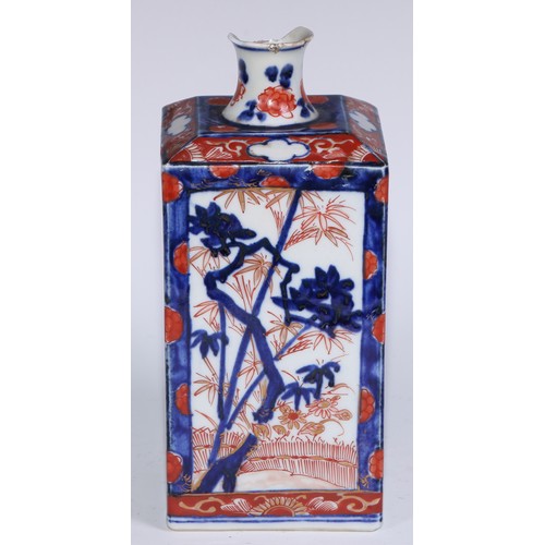 763 - A 17th century Japanese square vase, painted in the Imari palette with ikebana, flowers and prunus, ... 