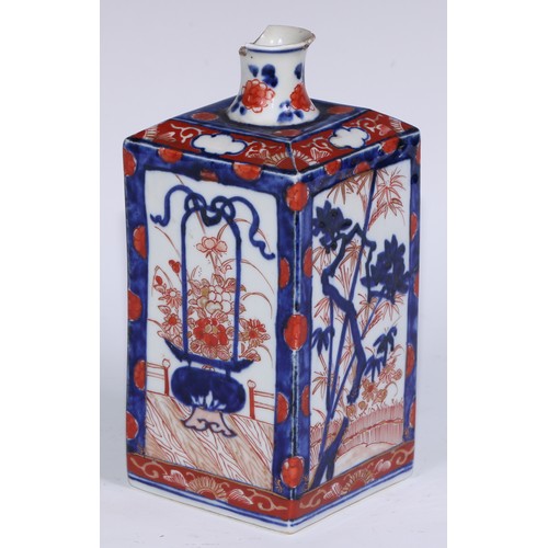 763 - A 17th century Japanese square vase, painted in the Imari palette with ikebana, flowers and prunus, ... 