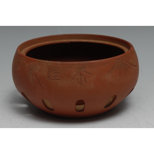 769 - A Japanese Yixing type terracotta kettle and stand, 30cm high overall