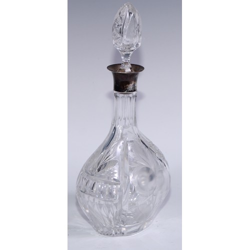 142 - A George V silver mounted decanter, cut and etched with ripe fruit, 31cm high, John Grinsell & Sons,... 