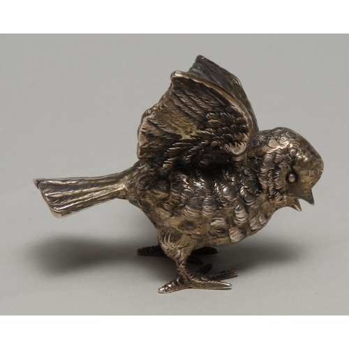 264 - An early 20th century cast silver model, of a bird, 8cm long, import mark for London 1904, 76g