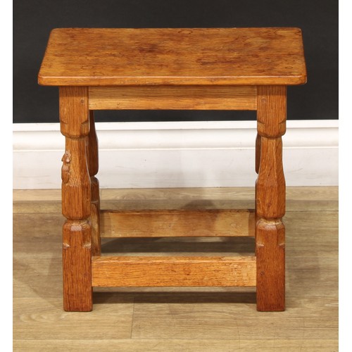 1631 - Mouseman of Kilburn - an oak joint stool, rectangular top, slightly outswept turned and panelled leg... 