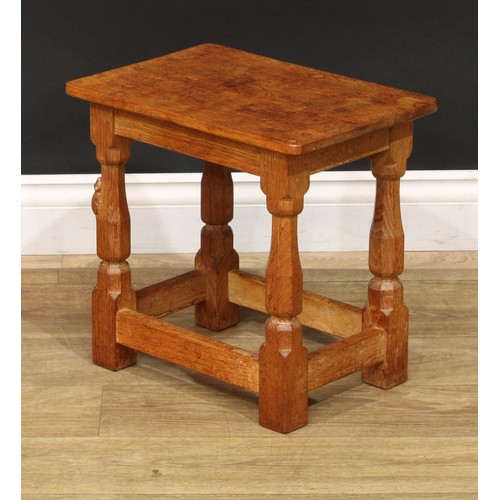 1631 - Mouseman of Kilburn - an oak joint stool, rectangular top, slightly outswept turned and panelled leg... 