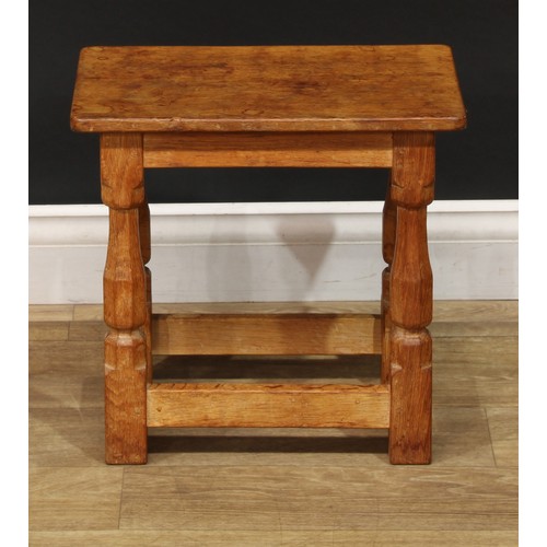 1631 - Mouseman of Kilburn - an oak joint stool, rectangular top, slightly outswept turned and panelled leg... 