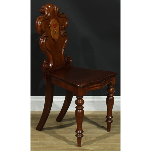 1407 - A pair of Victorian armorial hall chairs, cartouche shaped back applied with polychrome painted cres... 