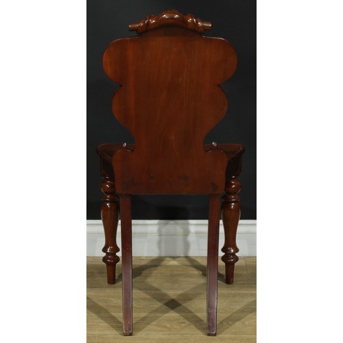 1407 - A pair of Victorian armorial hall chairs, cartouche shaped back applied with polychrome painted cres... 