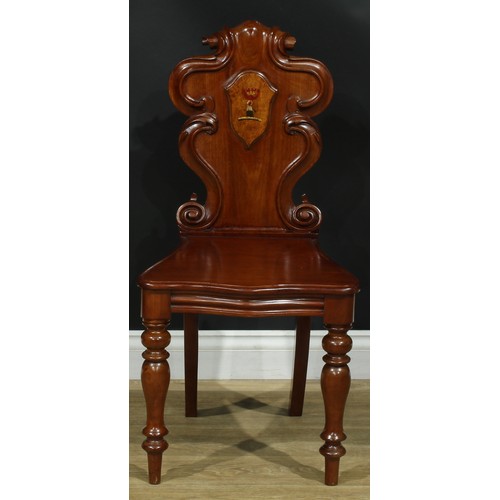 1407 - A pair of Victorian armorial hall chairs, cartouche shaped back applied with polychrome painted cres... 