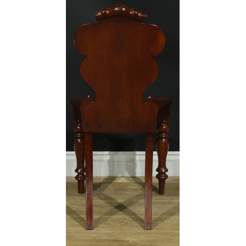 1407 - A pair of Victorian armorial hall chairs, cartouche shaped back applied with polychrome painted cres... 