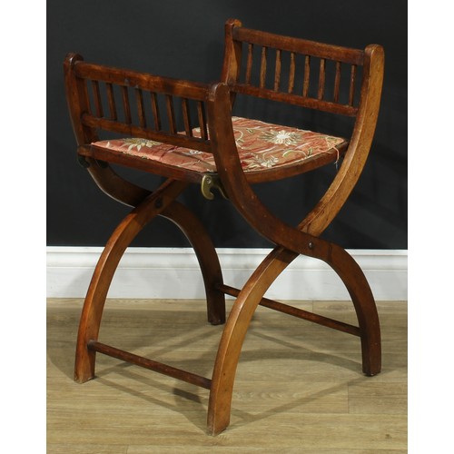 1399 - A pair of late 19th century campaign type folding X-frame stools, each with two settings, adjustable... 