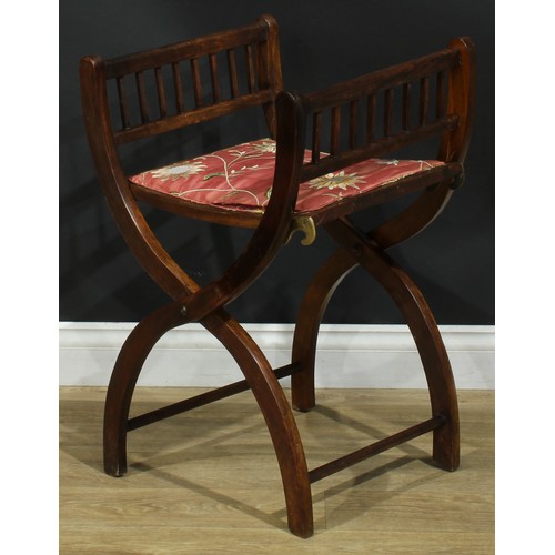 1399 - A pair of late 19th century campaign type folding X-frame stools, each with two settings, adjustable... 