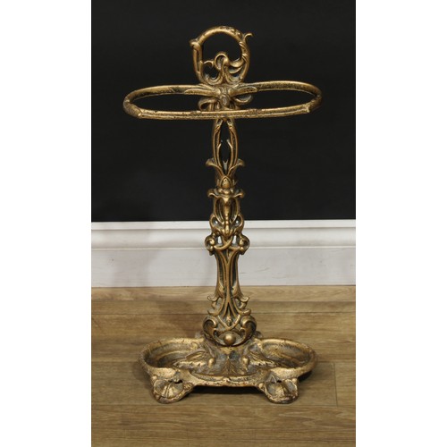 1443 - A Rococo Revival cast iron walking stick or umbrella stand, 58cm high, 31cm wide