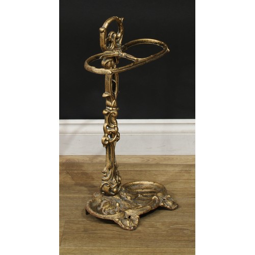 1443 - A Rococo Revival cast iron walking stick or umbrella stand, 58cm high, 31cm wide