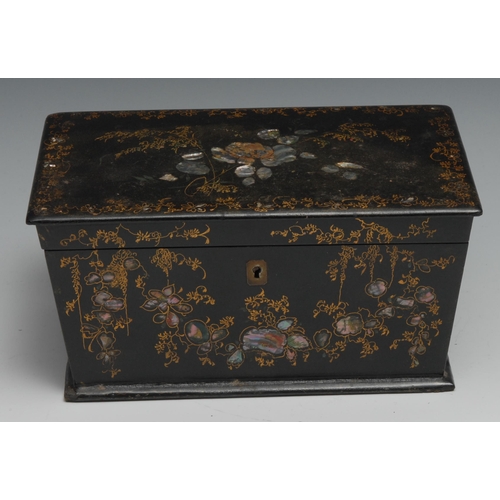 1393 - A Victorian papier mache tea caddy, inlaid with abalone shell and decorated in gilt, hinged cover en... 