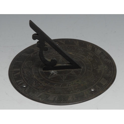 1075 - A bronze sundial, inscribed Set Me Right And Use Me Well/And I The Time To You Will Tell, 18cm diam,... 