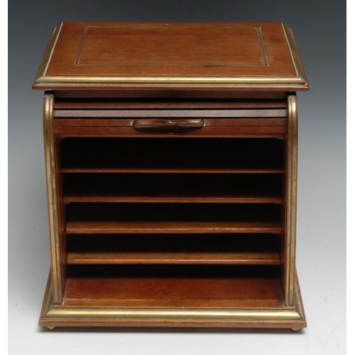 1155 - An early 20th century mahogany table top tambour fronted stationery cabinet, outlined with brass str... 