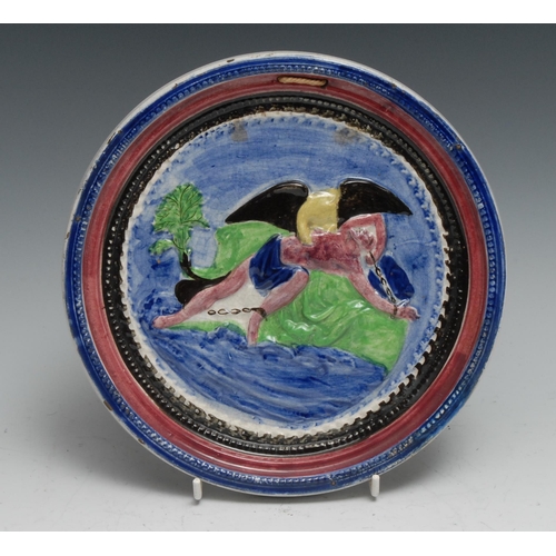 1198 - A pearlware circular plaque, moulded in relief with Prometheus tied to his rock, 22.5cm diam, c.1830