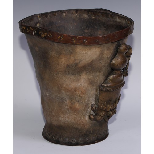 1158 - An unusual 19th century leather fire bucket, applied with a plaque cast as a whisky still, copper ri... 