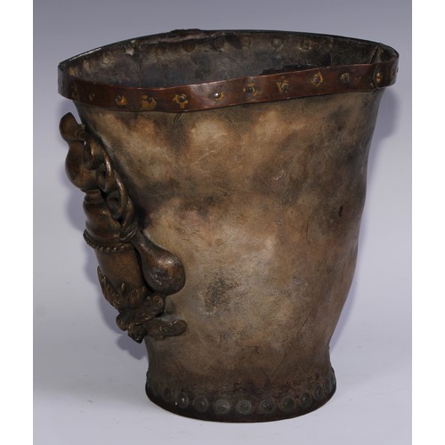 1158 - An unusual 19th century leather fire bucket, applied with a plaque cast as a whisky still, copper ri... 