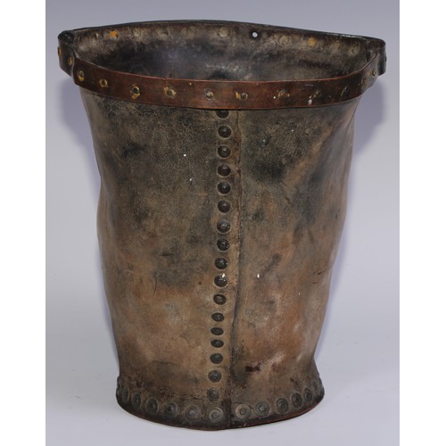 1158 - An unusual 19th century leather fire bucket, applied with a plaque cast as a whisky still, copper ri... 