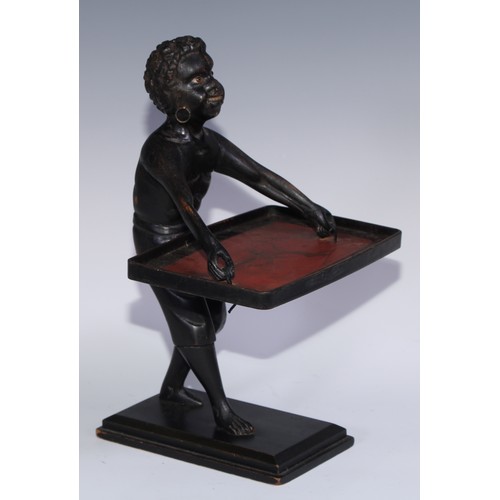 1247 - A Continental softwood table top blackamoor torchere, carved as a young boy holding a lacquer tray, ... 