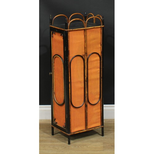 1375 - A pair of Aesthetic Movement bamboo and parcel-ebonised pedestal cabinets, each with three-quarter l... 