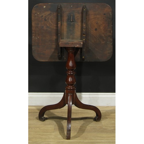 939 - A 19th century mahogany tripod occasional table, rounded rectangular tilting top, turned column, dow... 