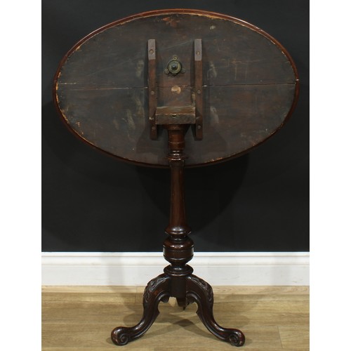 938 - A 19th century mahogany tripod occasional table, oval satinwood banded top inlaid with batwing trace... 