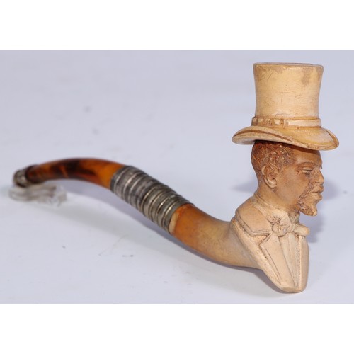 1262 - A late 19th century meerschaum pipe, carved as a gentleman, bust length, his top hat en suite, 12cm ... 