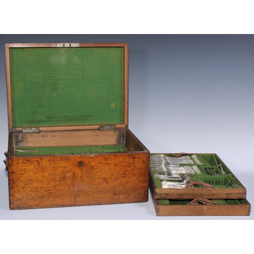 38 - A Victorian oak canteen of E.P.N.S Rich Bead pattern flatware, the rounded rectangular box with bras... 