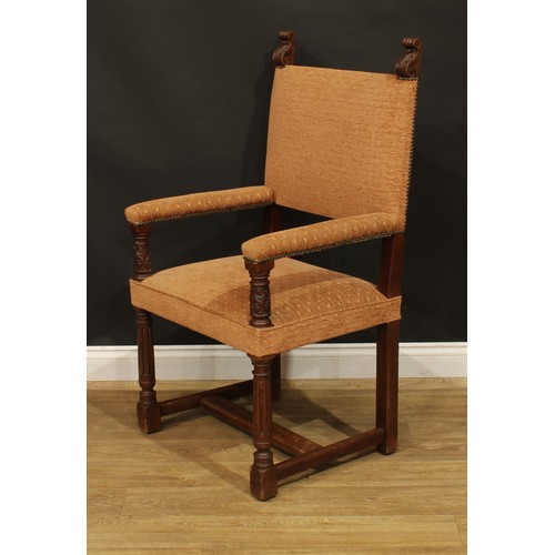 1130 - A set of twelve late Victorian Cromwellian Revival oak dining chairs, by Howard & Sons, comprising t... 