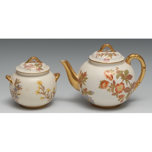 417 - A Royal Worcester Aesthetic Movement globular teapot and sucrier, printed and painted with blossomin... 