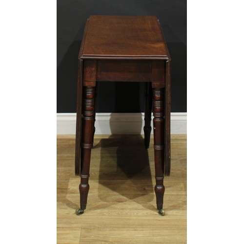 1431 - A Regency mahogany gateleg table, rounded rectangular top with channelled edge and fall leaves, ring... 