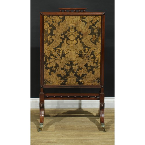 1430 - A Regency mahogany extending fire screen, rectangular frame with channelled edge, sabre legs, brass ... 