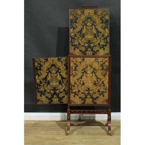 1430 - A Regency mahogany extending fire screen, rectangular frame with channelled edge, sabre legs, brass ... 