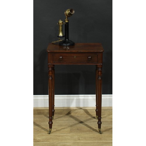 1439 - A Regency mahogany work table, rounded rectangular top above a long cockbeaded frieze drawer, ring-t... 