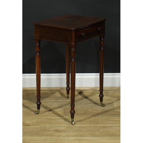 1439 - A Regency mahogany work table, rounded rectangular top above a long cockbeaded frieze drawer, ring-t... 