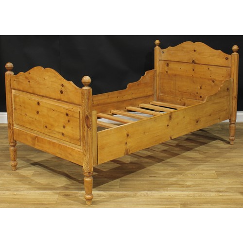 1327 - A late 19th century Scandinavian design pine single bed, possibly Swedish, the headboard 98cm high, ... 