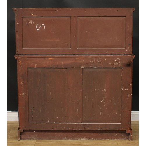 922 - A 19th century mahogany dining room press cabinet, rectangular superstructure with two doors, the pr... 