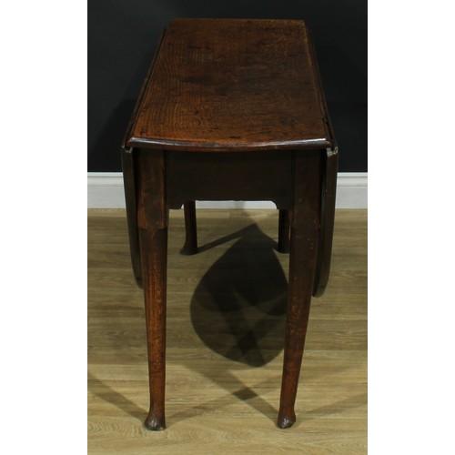 1093 - A George II oak gateleg table, oval top with fall leaves, straightened cabriole legs, 68cm high, 42c... 