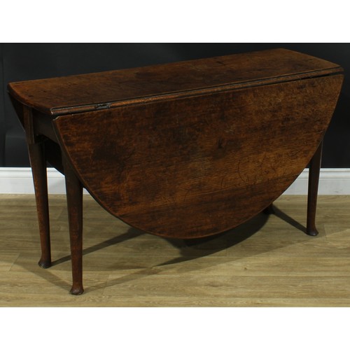 1093 - A George II oak gateleg table, oval top with fall leaves, straightened cabriole legs, 68cm high, 42c... 